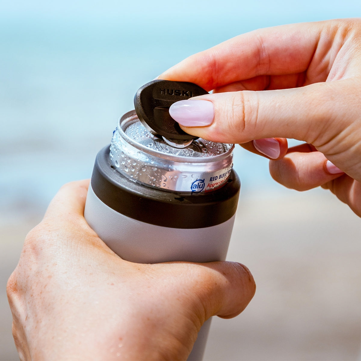 Huski Can Tab Slider opening a can