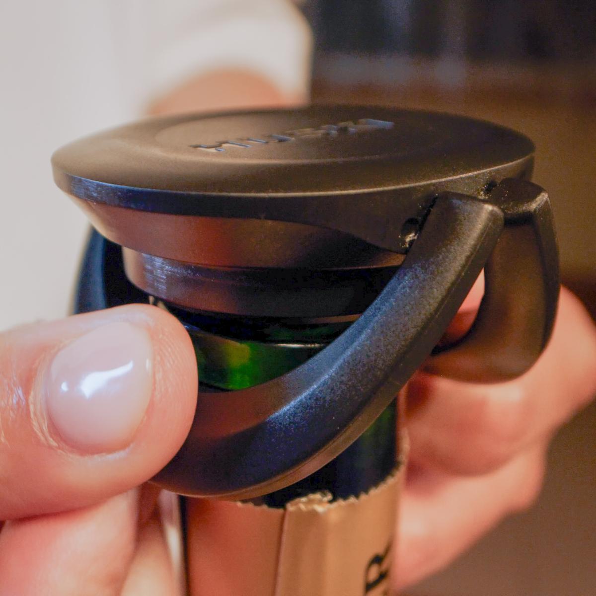 Huski BubbleLock Bottle Stopper in use